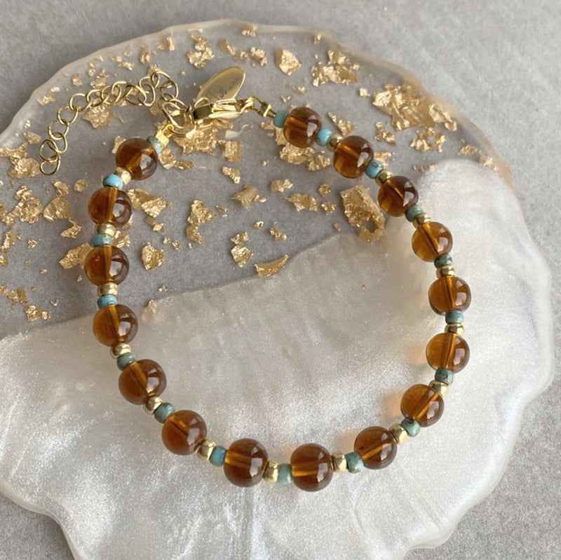 Bruine glaskralen armband Dames Rvs goud - Idhuna Jewels