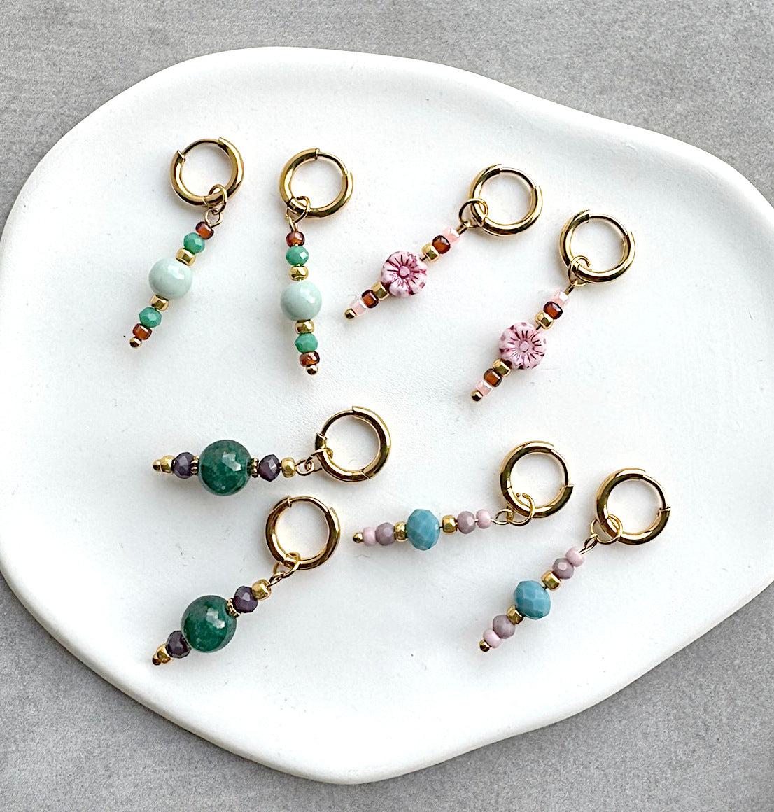 OORRINGEN GOUD MET BEDELS LEA