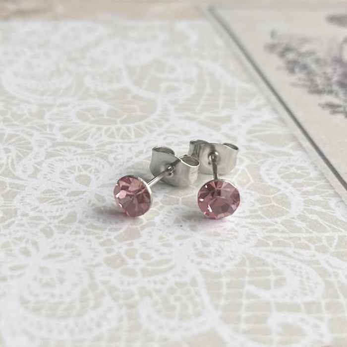 Rvs Oorknopjes zilver met roze kristallen - Idhuna Jewels