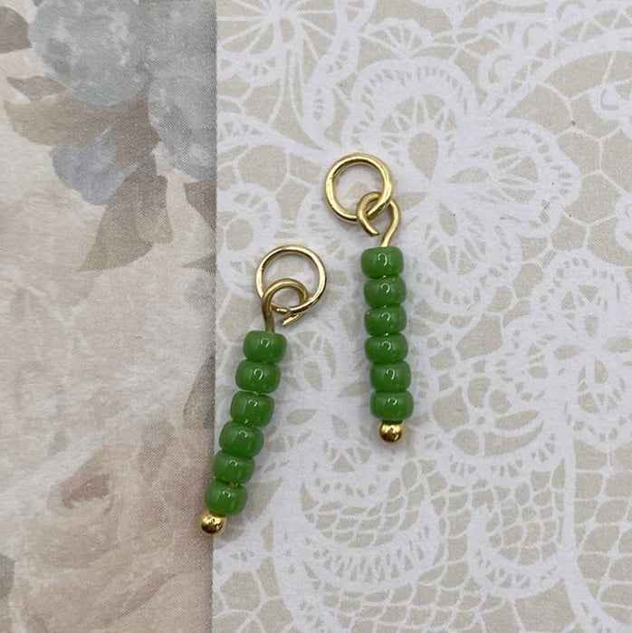 Bedels voor Oorringen Stainless Steel Goud met groene kraaltjes - Idhuna Jewels