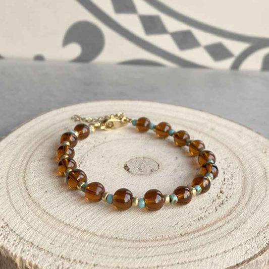 Bruine glaskralen armband Dames Rvs goud - Idhuna Jewels