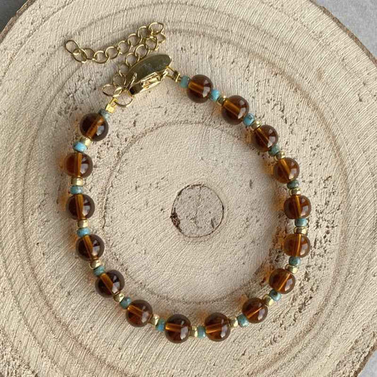 Bruine glaskralen armband Dames Rvs goud - Idhuna Jewels