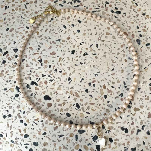 Dames Ketting Beige Facet glaskralen Rvs goud Parelmoer Hartje - Idhuna Jewels