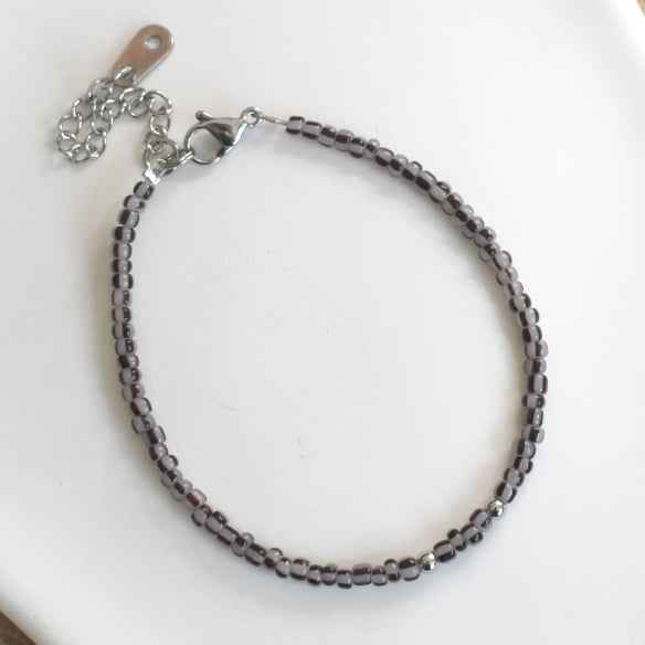 Dames armband zwart wit gestreepte kralen Staal zilver - Idhuna Jewels