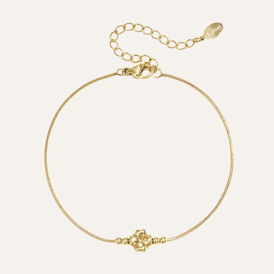 Klavertje vier armband met kralen goudkleurig 