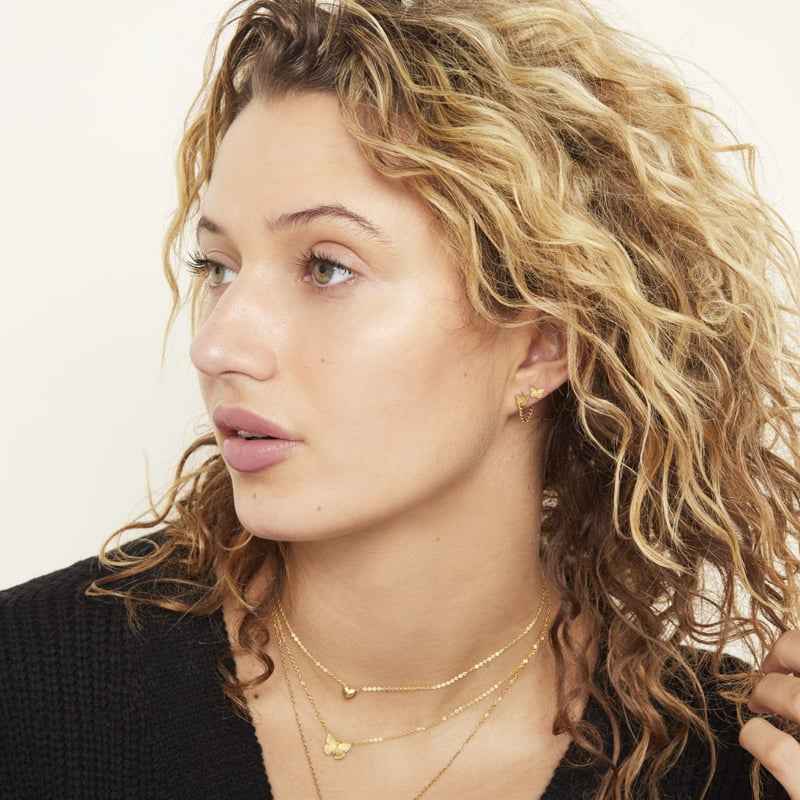 Oorbellen Chirurgisch Staal Vlinder Oorknopjes goudkleurig - Idhuna Jewels