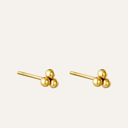 Oorbellen drie bolletjes Triple Bullet mini staal oorknopjes Goud