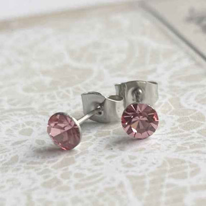 Rvs Oorknopjes zilver met roze kristallen - Idhuna Jewels
