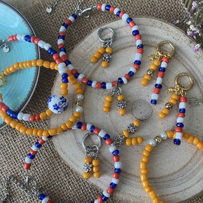 Rood wit blauwe oorbellen Holland Voetbal koningsdag staal goudkleurig - Idhuna Jewels