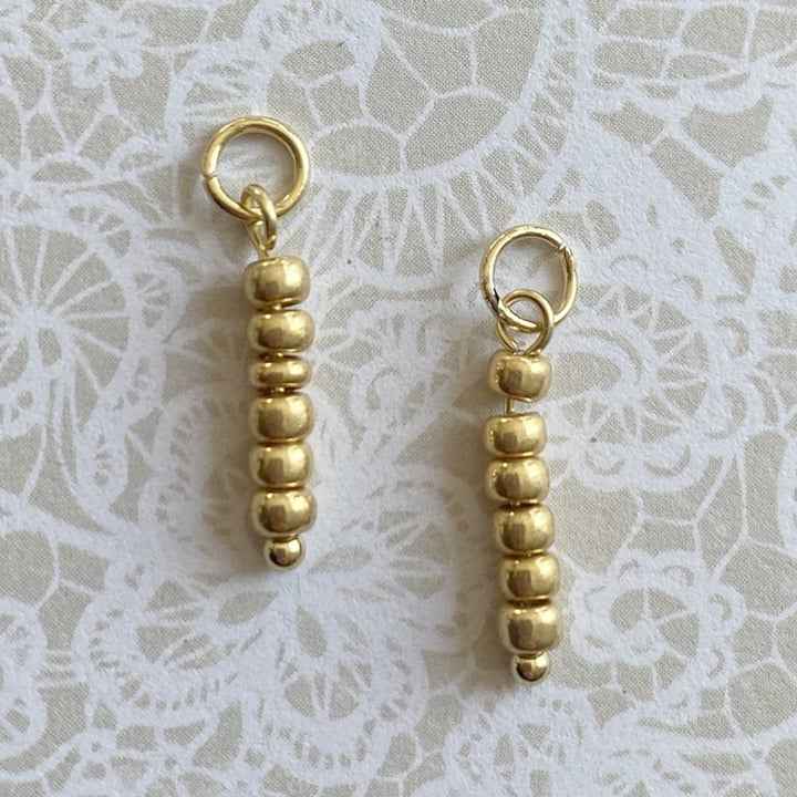 Rvs Bedels voor Oorringen Goudkleurige rocailles kralen - Idhuna Jewels