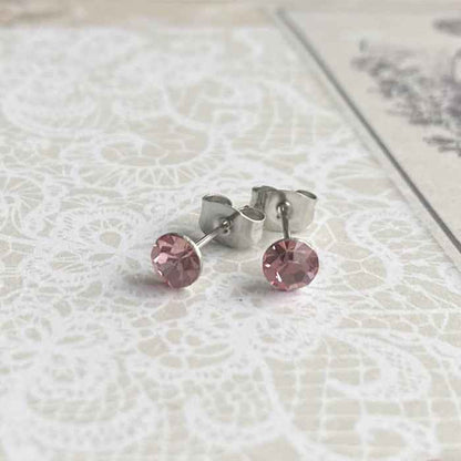 Rvs Oorknopjes zilver met roze kristallen - Idhuna Jewels