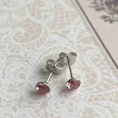 Rvs Oorknopjes zilver met roze kristallen - Idhuna Jewels