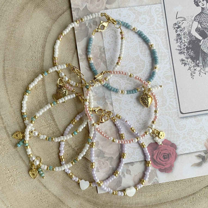 Witte Kralen Kinderarmband met hartjes bedeltje - Idhuna Jewels