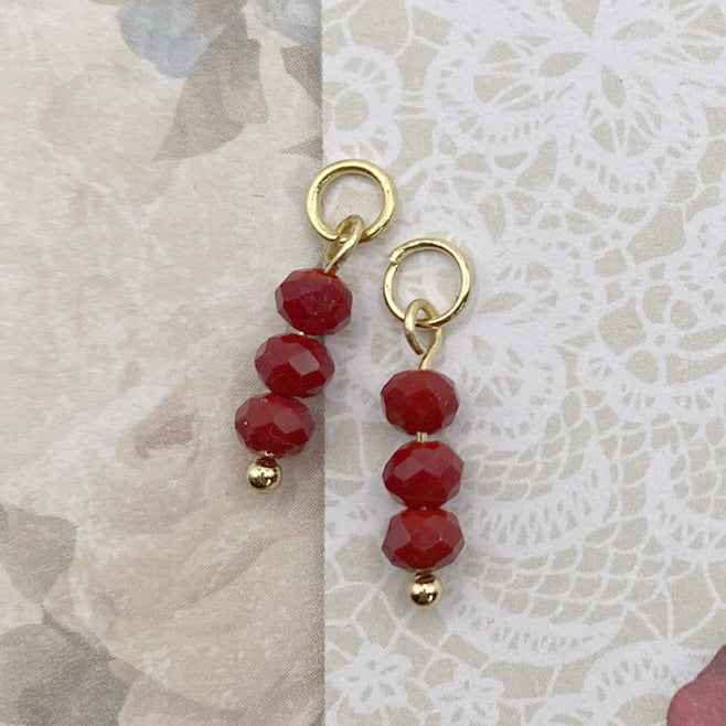 Bedels voor Oorbellen Rvs goud met rode facet kralen - Idhuna Jewels